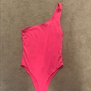 Neon pink one shoulder bodysuit
